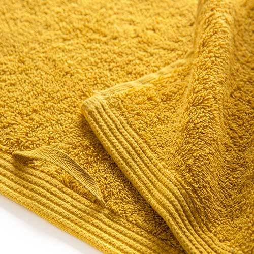 New Plus håndklæder - Mustard